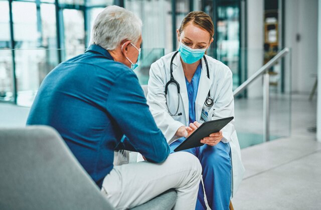 Doctor consulting patient